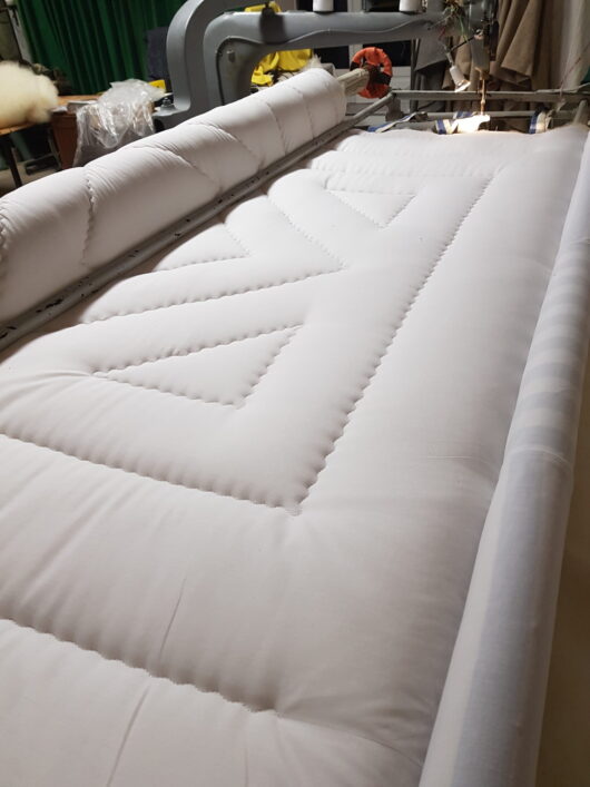 couette en laine blanche